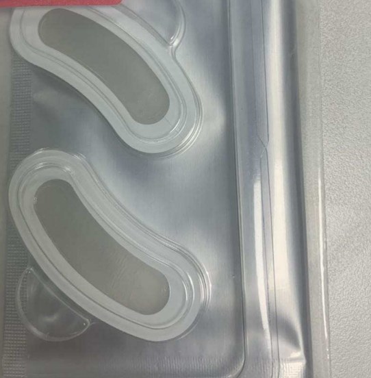Yanse microdart (microneedle) eye patch — production sample in blister tray